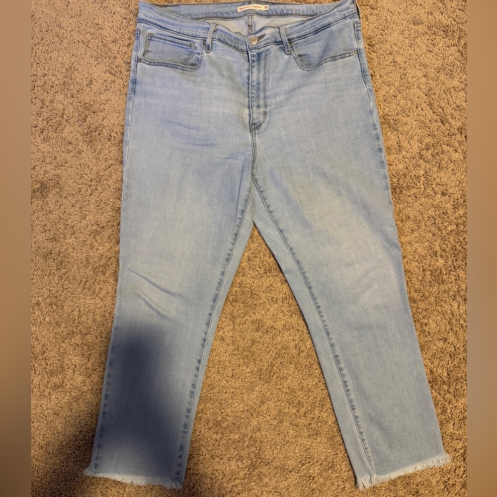 Levi Women’s jeans. Size 33. Light wash, stretchy fit. Straight leg.